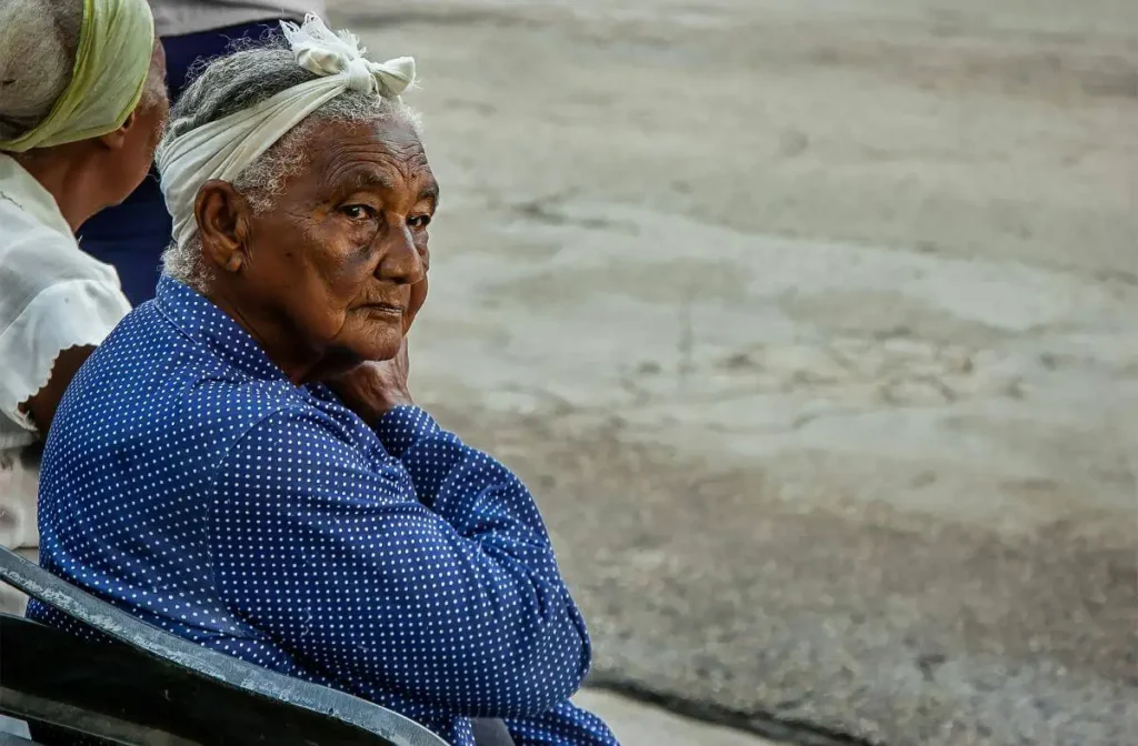 Elderly woman portrait reflecting dignity and resilience in the context of global aging challenges